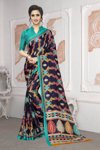 For Your Semi-Casual Wear, Grab This Lovely Printed Saree In Navy Blue Color. This Saree And Blouse Are Fabricated On Soft Cotton Which Is Light Weight, Soft Towards Skin And Easy To Carry All Day Long