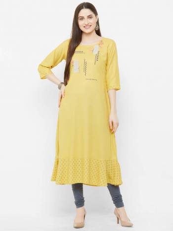 You Will Definitely Earn Lots Of Compliments Wearing This Readymade Kurti In Yellow Color Fabricated On Rayon. It Is Light In Weight And Easy To Carry all Day Long. 