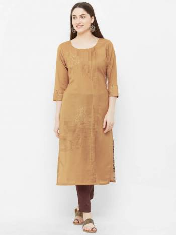 Rich Looking Designer Readymade Kurti Is Here In Beige Color. This elegant kurti Is Cotton Based Which Gives A Rich Look To Your Personality. 