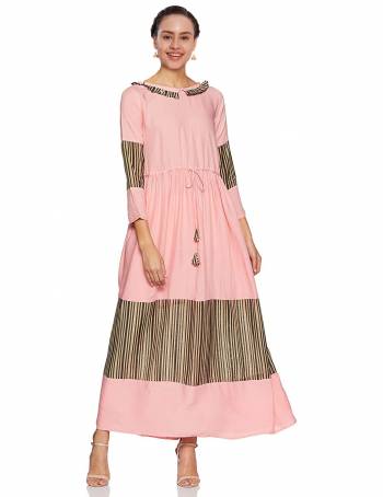 Look Pretty In This Tunic Patterned Readymade Long Kurti In Pink Color. This Kurti Is Fabricated On Rayon Beautified With Prints. Buy Now.