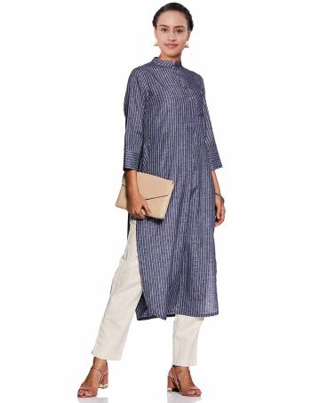 Beat The Heat This Summer With Cool Cotton Kurti With This Readymade Kurti In Navy Blue Color Fabricated On Cotton. It Is Beautified With Lining Prints All Over. 