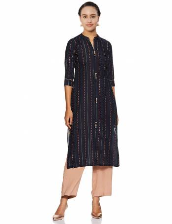 Here Is A Pretty Pair Of Readymade Kurti With Bottom In Navy Blue And Beige Color Respetively. This Printed Kurti Is Fabricated On Cotton Paired With Rayon Fabricated Plain Bottom. 