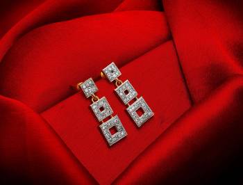 Here Is A Very Pretty Pair Of Simple And Elegant Looking Earring Set In Golden Color. It Has Pretty Unique pattern With Attractive Diamond Work. You can Pair This Even With Simple Attire As Well As A Heavy One. This Pretty Evergreen Design Compliments Any Kind Of Attire You Wear