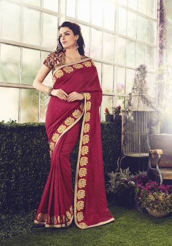 Go For This Lovely Floral Designer Saree In Maroon Color Paired With Heavy Embroidered Blouse.  This Pretty Saree And Blouse Are Fabricated On Cotton Which Is Soft Towards Skin And Easy To Carry All Day Long. 