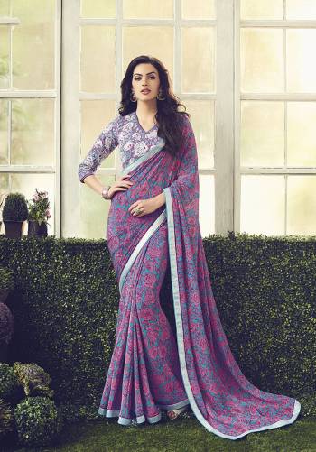 Go For This Lovely Floral Printed Designer Saree In Purple Color Paired With Heavy Embroidered Blouse.  This Pretty Saree And Blouse Are Fabricated On Crepe Which Is Soft Towards Skin And Easy To Carry All Day Long. 
