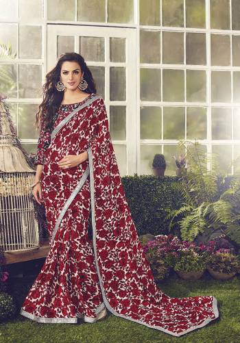 Add This Designer Saree To Your Wardrobe In Red Color. This Saree And Blouse Are Fabricated Crepe Beautified With Lovely Floral Prints And Heavy Embroidered Blouse. Buy This Saree Now.