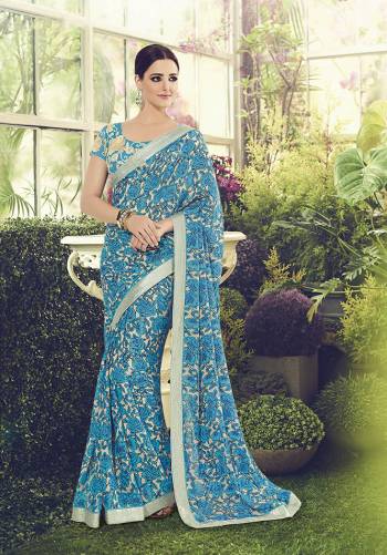 Go For This Lovely Floral Printed Designer Saree In Blue Color Paired With Heavy Embroidered Blouse.  This Pretty Saree And Blouse Are Fabricated On Crepe Which Is Soft Towards Skin And Easy To Carry All Day Long. 