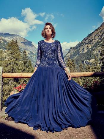 Catch All The Limelight At The Next Wedding You Attend Wearing This Beautiful Heavy Designer Readymade Gown In Royal Blue Color Paired With Royal Blue Colored Dupatta. This Lovely Gown IS Georgette Based With Attractive Net Fabricated Embroidered Yoke And Sleeve Paired With Chiffon Fabricated Dupatta. 