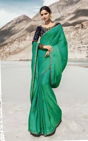 Catch All The Limelight At The Function You Attend Wearing This Designer Saree With Heavy Blouse Concept. This Rich Silk Based Saree IS In Sea Green Color Paired With Contrasting Navy Blue Colored Blouse. Buy Now.