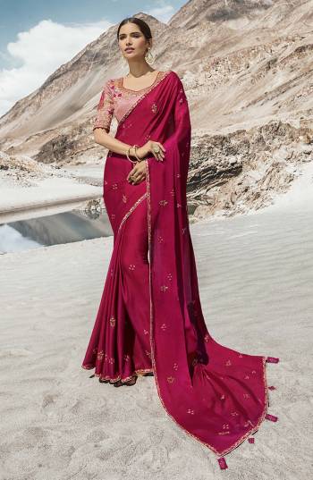 Here Is A Beautiful Designer Saree To Add Into Ypur Wardrobe For The Upcoming Wedding And Festive Season In Dark Pink Color Paired With Baby Pink Colored Blouse. This Saree And Blouse Are Silk Based Which Gives A Rich Look To Your Personality. 