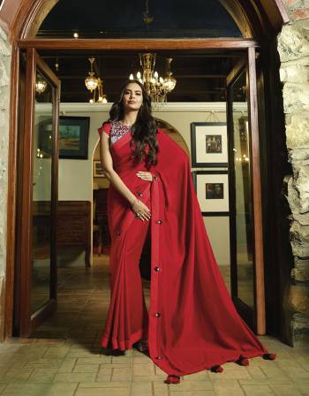Adorn The Pretty Angelic Look Wearing This Lovely Designer Saree In Red Color Paired With Grey And Red Colored Blouse. This Saree Is Fabricated On Satin Silk Paired With Art Silk Fabricated Blouse. Buy Now. 