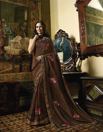 Enhance Your Personality Wearing This Designer Saree In Brown Color Paired With Black Colored Blouse. This Saree Is Fabricated on Soft Silk Paired With art Silk Fabricated Blouse. It Is Beautified With Contrasting Resham Work Giving An Attractive Look. 