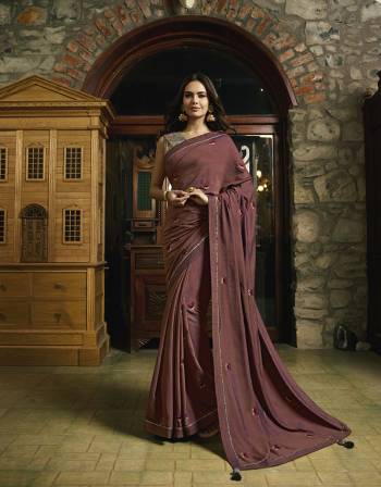 New Shade Is Here To Add Into Your Wardrobe With This Designer Saree In Mauve Color Paired With Multi Colored Blouse. This Saree Is Fabricated On Cotton Silk Paired With Art Silk Fabricated Blouse. Buy Now.