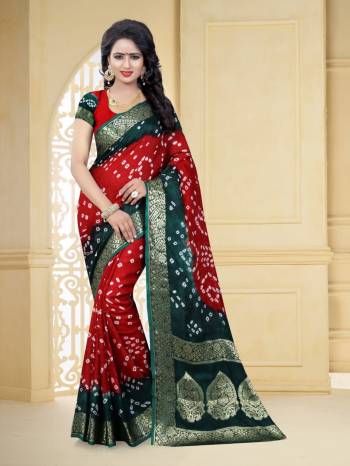 Grab This Pretty Designer Bandhani Saree In Red And Dark Green Color. This Saree And Blouse Are Fabricated On Art Silk Beautified With Prints And Weaved Lace Border. It Is Light In Weight And Easy To Carry All Day Long