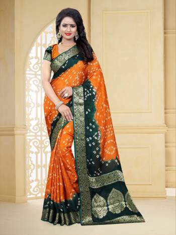Grab This Pretty Designer Bandhani Saree In Orange And Dark Green Color. This Saree And Blouse Are Fabricated On Art Silk Beautified With Prints And Weaved Lace Border. It Is Light In Weight And Easy To Carry All Day Long