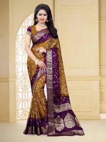 Grab This Pretty Designer Bandhani Saree In Occur Yellow And Purple Color. This Saree And Blouse Are Fabricated On Art Silk Beautified With Prints And Weaved Lace Border. It Is Light In Weight And Easy To Carry All Day Long