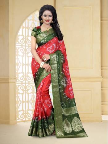 Grab This Pretty Designer Bandhani Saree In Dark Peach And Green Color. This Saree And Blouse Are Fabricated On Art Silk Beautified With Prints And Weaved Lace Border. It Is Light In Weight And Easy To Carry All Day Long