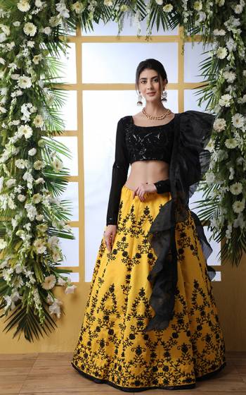 Grab This Bold And Beautiful Look Designer Lehenga Choli In Black Colored Blouse Paired With Yellow Colored Lehenga And Black Dupatta. Its Pretty Blouse Is Georgette Based Paired With Art Silk Lehenga And Orgenza Fabricated Dupatta. 