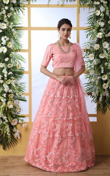 Look Pretty In This Very Beautiful , Elegant Designer Lehenga Choli In All Over Pink Color. Its Blouse Is Silk Based Paired With Net Fabricated Lehenga And Dupatta. Buy This Pretty Piece Now.