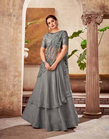  Break the monotony of routine ethnic wear and embrace this monotone grey lehenga saree instead to give that much needed spark to your look and make you appear ahead of time. 