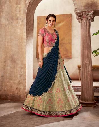 A majestic union of vibrant hues , intricate weaves and classic embroideries, this eternal style lehenga saree will give you a royal glimpse of past while adhering to the modern aspects of fashion. 