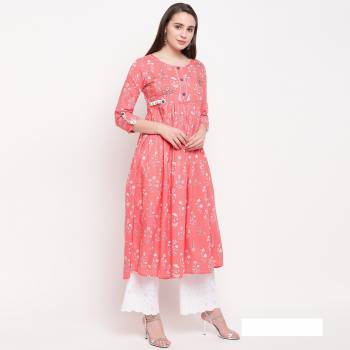 Here Is A Designer Readymade A-Line Patterned Kurti In Pink Color. It Is Fabricated On Cotton Beautified With Prints And Hand Work. It Is Light In Weight And Can Be Paired With Same Of Contrasting Colored Bottom. 