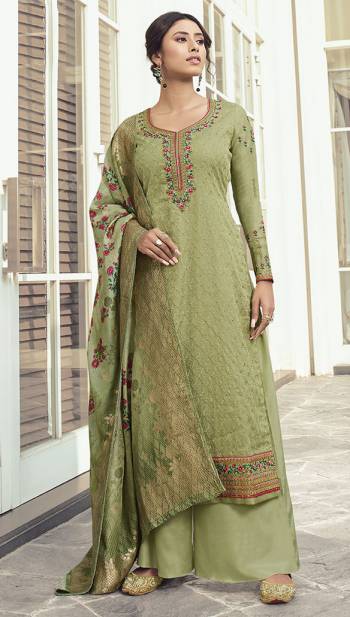 Flaunt Your Rich and Elegant Taste Wearing This Designer Heavy Straight Cut Suit In Light Green Color. Its Lovely Heavy Embroidered Top Is Fabricated On Satin Silk Paired With Santoon Bottom And Jacquard Rayon Fabricated Dupatta. Buy This Elegant Designer Piece Now.