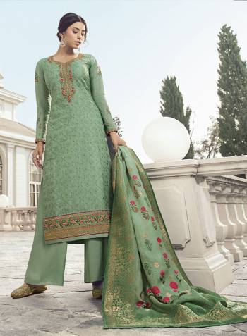 Flaunt Your Rich and Elegant Taste Wearing This Designer Heavy Straight Cut Suit In Green Color. Its Lovely Heavy Embroidered Top Is Fabricated On Satin Silk Paired With Santoon Bottom And Jacquard Rayon Fabricated Dupatta. Buy This Elegant Designer Piece Now.