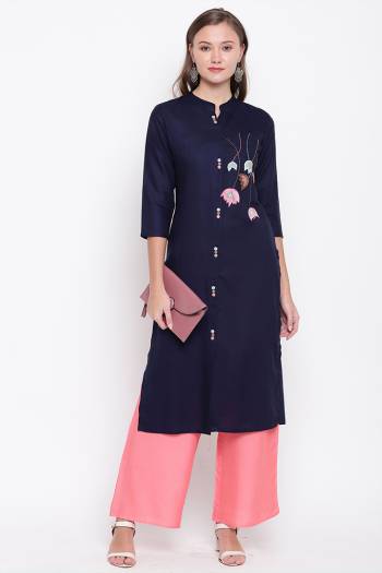 Grab This Beautiful Kurti In Navy Blue Color Fabricated On Rayon. This Readymade Straight Kurti IS Light Weight And Can Be Paired With Same Or Contrasting Colored Bottom. 