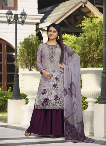 Enhance Your Personality In This Rich And Elegant Looking Printed Suit In Mauve And Wine Color. This Dress Material Is Fabricated On Crepe Paired With Georgette Fabricated Dupatta. Buy Now