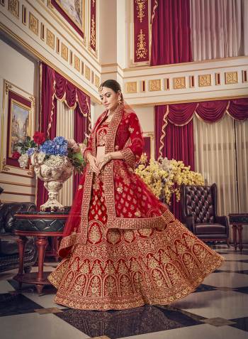 Look Pretty In This Every Girl's Favourite Color For Bridal Wear In?All Over Red Colored Lehenga Choli. This Very Beautiful Heavy Designer Lehenga Choli Is Fabricated on Satin Paired With Net Fabricated Dupatta. Buy Now. Its Attractive Embroidery And Color Will Definitlely Earn You Lots Of Compliments From Onlookers. 