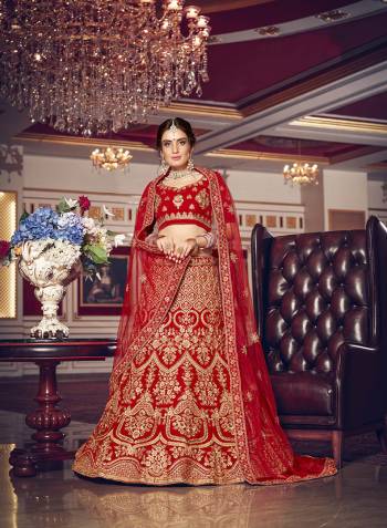 Look Pretty In This Every Girl's Favourite Color For Bridal Wear In?All Over Red Colored Lehenga Choli. This Very Beautiful Heavy Designer Lehenga Choli Is Fabricated on Velvet Paired With Net Fabricated Dupatta. Buy Now. Its Attractive Embroidery And Color Will Definitlely Earn You Lots Of Compliments From Onlookers. 