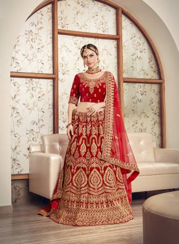 Look Pretty In This Every Girl's Favourite Color For Bridal Wear In?All Over Red Colored Lehenga Choli. This Very Beautiful Heavy Designer Lehenga Choli Is Fabricated on Velvet Paired With Net Fabricated Dupatta. Buy Now. Its Attractive Embroidery And Color Will Definitlely Earn You Lots Of Compliments From Onlookers. 