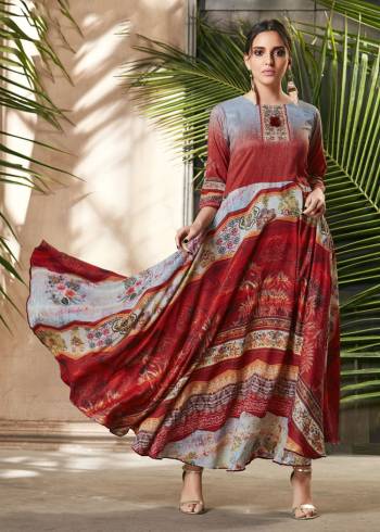 For Your Semi-Casual Wear, Grab This Readymade Gown In Red And Grey Color Beautified With Prints All Over. It Is Fabricated On Soft Silk Which Is Light Weight, Durable And Easy To care For. 