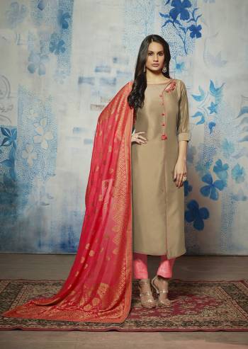 Flaunt Your Rich And Elegant Taste Wearing This Lovely Set Of Kurti With Dupatta In Beige And Dark Pink Color Respectively. Its Top Is Fabricated On Muslin Paired With Jacquard Silk Dupatta. 