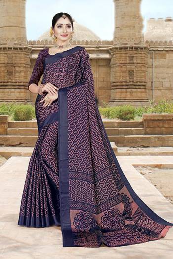 Add This Beautiful Saree To Your Wardrobe In Navy Blue And Pink Color. This Saree And Blouse Are Fabricated On Brasso Silk Which Is Light Weight, And Gives A Rich Look To Your Personality. 