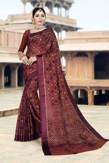 Add This Beautiful Saree To Your Wardrobe In Wine Color. This Saree And Blouse Are Fabricated On Brasso Silk Which Is Light Weight, And Gives A Rich Look To Your Personality. 