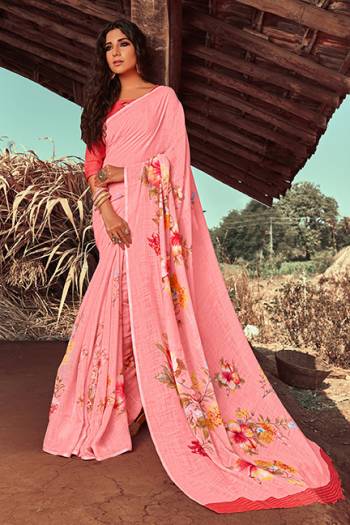 Flaunt Your Rich And Elegant Taste Wearing This Designer Saree In Pink Color Paired With  Dark Pink Colored Blouse. This Saree and Blouse are Fabricated on Linen Beautified With Pretty Floral Prints. 