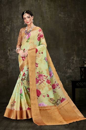 Flaunt Your Rich And Elegant Taste Wearing This Prtety Simple Printed Saree In Light Green Color Paired With Beige Colored Blouse. This Saree And Blouse Are Fabricated On Cotton Silk With Attractive Jacquard Silk Border. 