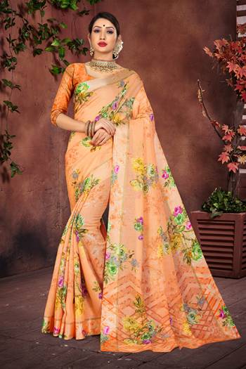 Add This Designer Printed Saree To Your Wardrobe In Light Orange Color Paired With Orange Colored Blouse. This Saree And Blouse Are Fabricated On Cotton Silk Beautified Attractive Satin Border And Floral Prints. 