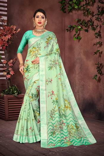 Grab This Pretty Saree In Sea Green Color For Your Semi-Casual And Festive Wear. This Saree And Blouse Are Fabricated On Cotton Silk Beautified With Pretty Prints And Attractive Satin Border. 