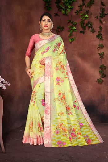 Add This Designer Printed Saree To Your Wardrobe In Light Yellow Color Paired With Pink Colored Blouse. This Saree And Blouse Are Fabricated On Cotton Silk Beautified Attractive Satin Border And Floral Prints. 