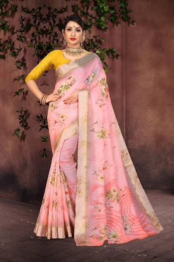 Add This Designer Printed Saree To Your Wardrobe In Baby Pink Color Paired With Yellow Colored Blouse. This Saree And Blouse Are Fabricated On Cotton Silk Beautified Attractive Satin Border And Floral Prints. 