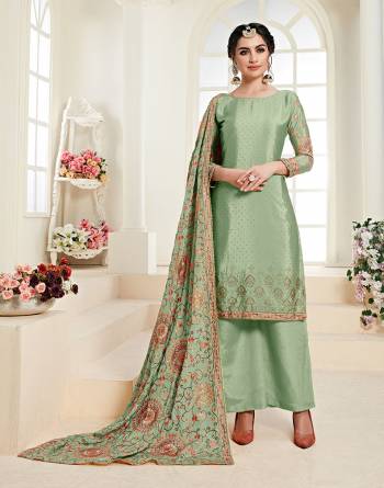 Here Is A Very Pretty Designer Trendy Suit In Light Green Color. Its Heavy Embroidered Top And Dupatta Are Chinon Based Paired With Santoon Fabricated Bottom. Its Highlight Is Its Heavy Embroidered Dupatta Which Will Earn You Lots Of Compliments From Onlookers. 