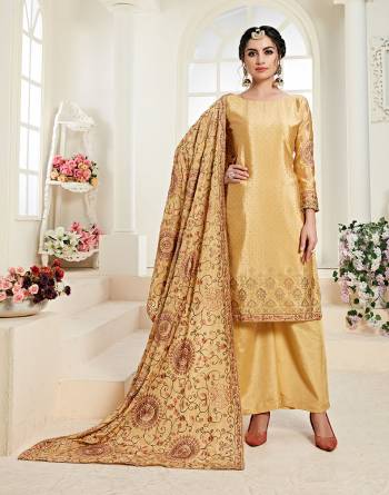 Grab This Very Beautiful Heavy Designer Suit In All Over Occur Yellow Color. Its Top And Dupatta Are Fabricated On Chinon Beautified With Heavy Embroidery Paired With Santoon Bottom. Buy This Pretty Suit Now.