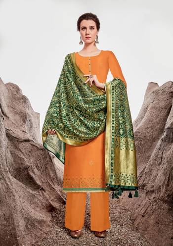 Here Is Beautiful Designer Straight Suit In Orange Color Paired With Contrasting Dark Green Colored Dupatta. Its Top Is Fabricated On Nylon Chanderi Paired With Satin Cotton Bottom And Jacquard Silk Dupatta. Its Top Is Beautified With Stone Work Giving An Attractive Look.