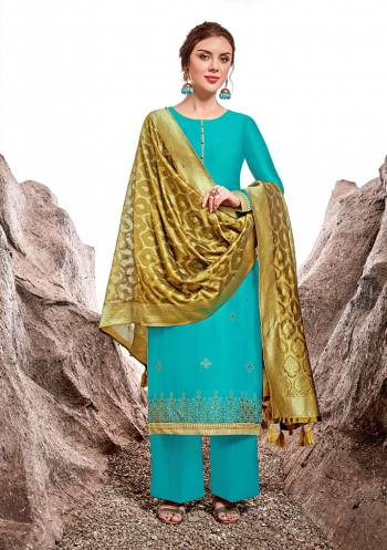 Add This Lovely Designer Straight Suit To Your Wardrobe In Sky Blue Color Paired With Contrasting Pear Green Colored Dupatta. Its Pretty Top Is Fabricated On Nylon Chanderi Paired With Cotton Satin Bottom And Jacquard Silk Fabricated Dupatta. Its Top Is Beautified With Attractive Stone Work and Weaved Dupatta. 