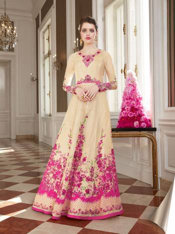 You Will Definitely Earn Lots Of Compliments Wearing This Designer Floor Length Suit In Cream And Pink Color. Its Pretty Top Is Georgette Based Paired With Santoon Bottom And Chiffon Fabricated Dupatta. Its Pretty Color And Pattern Will Give You A Look Like Never Before. 