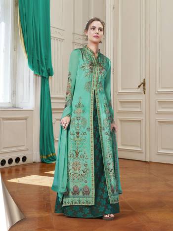 Grab This Pretty Designer Suit In Sea Green Color For The Upcoming Festive And Wedding Season. Its Top Is Georgette Based Paired With Santoon Bottom And Chiffon Fabricated Dupatta. It Is Beautified With Prints And Stone Work. Buy Now.