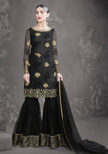 For A Bold And Beautiful Look, Grab This Heavy Designer Sharara Suit In All Over Black Color. Its Top And Bottom Are Net Based Paired With Chiffon Fabricated Dupatta. Buy Now.